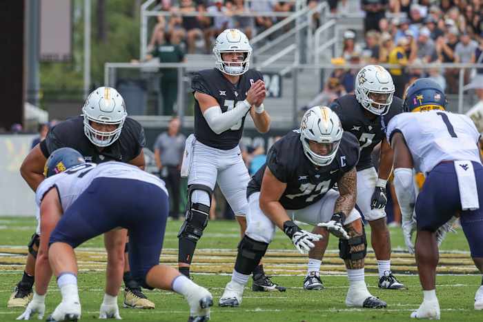 Oct 28, 2023; Orlando, Florida, USA; UCF Knights quarterback John Rhys Plumlee (10) calls for the snap against the West Virginia Mountaineers during the first quarter at FBC Mortgage Stadium. Mandatory Credit: Mike Watters-USA TODAY Sports